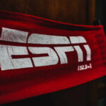 Close-up of a red fabric banner featuring the ESPN logo