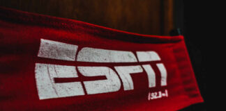 Close-up of a red fabric banner featuring the ESPN logo