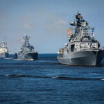 U.S. Navy’s SHOCKING $1.85B Foreign Shipyard Plan A fleet of military ships sailing in the ocean