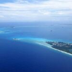Cascadia Plate Breakup Caught On Camera Aerial view of a tropical island surrounded by blue ocean waters