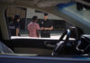 Police officers interacting with a civilian during a traffic stop