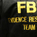 FBI’s DNA Breakthrough Nabs Decade-Long Rapist Close-up of an FBI Evidence Response Team jacket with gold lettering