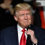 White House Dinner EVACUATED — Officer Shot Donald Trump speaking at a rally with a microphone