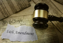 125-Year-Old Case Bottlenecks the Border Gavel resting on documents featuring the 14th Amendment