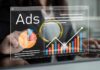 Person analyzing advertising data on a digital interface