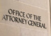 Sign on a building indicating the Office of the Attorney General
