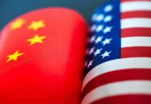 China Files Claim Sparks Media Standoff Chinese and American flags side by side