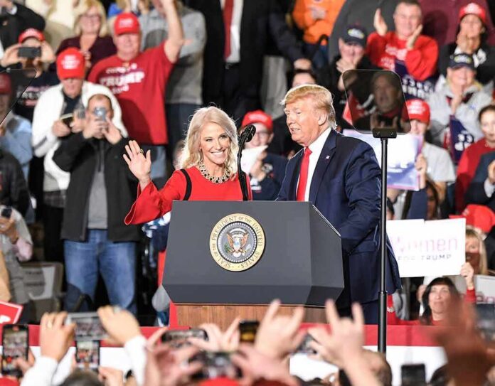 political rally with two speakers at a podium