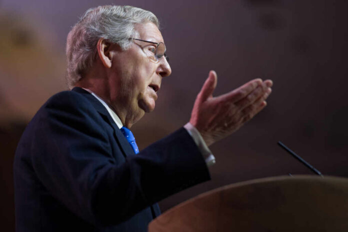 Politician delivering a speech with hand gestures